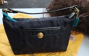 Coach Black Shoulder Bag with Gold Accents